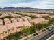 Aerial community view showing landscaping and mountain views at 2376 Via Firenze, Henderson, NV 89044