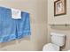 Stylish half bathroom with white fixtures and clean lines at 2376 Via Firenze, Henderson, NV 89044