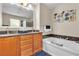 Well-appointed bathroom with double sinks, large tub, and separate glass shower at 2376 Via Firenze, Henderson, NV 89044