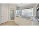 Elegant bathroom featuring a large tub, shower and a window at 2705 Crystal Beach Dr, Las Vegas, NV 89128
