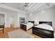 Bright bedroom featuring a ceiling fan, and two beds at 2705 Crystal Beach Dr, Las Vegas, NV 89128