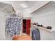 Walk in closet with racks, shelving and wardrobe at 2705 Crystal Beach Dr, Las Vegas, NV 89128