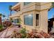 Exterior showcasing the home's architectural details and mature landscaping at 2705 Crystal Beach Dr, Las Vegas, NV 89128