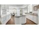 Well-appointed kitchen with granite countertops, a center island, and stainless steel appliances at 2705 Crystal Beach Dr, Las Vegas, NV 89128