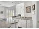 Bright kitchen boasts granite counters, stainless appliances, and a functional center island at 2705 Crystal Beach Dr, Las Vegas, NV 89128
