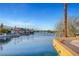Lake view from a balcony with other community homes in the distance at 2705 Crystal Beach Dr, Las Vegas, NV 89128