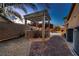 Outdoor kitchen and bar area near a custom pool at 2764 Kilwinning Dr, Henderson, NV 89044
