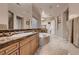 Luxurious bathroom featuring a soaking tub, a double sink vanity, tile floors and walk-in shower at 2764 Kilwinning Dr, Henderson, NV 89044