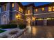 Stately two-story home with manicured landscaping, three-car garage, and an inviting front entrance at 2764 Kilwinning Dr, Henderson, NV 89044