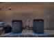 Two modern HVAC units sit outside on a gravel bed next to brick pavers at 2764 Kilwinning Dr, Henderson, NV 89044