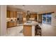 Spacious kitchen with a center island, stainless steel appliances, and backyard access at 2764 Kilwinning Dr, Henderson, NV 89044