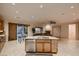 Gourmet kitchen island with a stainless steel dishwasher and a sink; perfect for entertaining at 2764 Kilwinning Dr, Henderson, NV 89044
