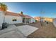 The backyard provides a low-maintenance landscape, a covered patio, and room for customization at 2914 Luminous Ct, North Las Vegas, NV 89032