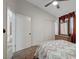 Bright bedroom with a comfortable bed, dresser, and a closet with sliding doors at 2914 Luminous Ct, North Las Vegas, NV 89032