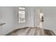 Bright dining area with modern flooring and access to an outdoor patio at 2914 Luminous Ct, North Las Vegas, NV 89032