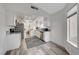 Updated kitchen featuring white cabinets, stainless steel appliances, and granite countertops at 2914 Luminous Ct, North Las Vegas, NV 89032