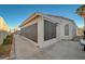Enclosed patio features a concrete floor and screens for enjoying outdoor living with added privacy at 2914 Luminous Ct, North Las Vegas, NV 89032