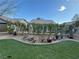 This backyard features a well-maintained lawn and desert landscaping for relaxed outdoor living at 3609 Citrus Heights Ave, North Las Vegas, NV 89081