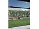 This backyard features a well-maintained lawn and desert landscaping for relaxed outdoor living at 3609 Citrus Heights Ave, North Las Vegas, NV 89081