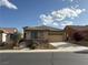 Charming single-story home features desert landscaping, an attached two-car garage, and a neutral color scheme at 3609 Citrus Heights Ave, North Las Vegas, NV 89081