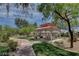 Scenic outdoor gazebo surrounded by lush greenery and a paved pathway for relaxing at 3609 Citrus Heights Ave, North Las Vegas, NV 89081