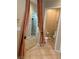Hallway leads to bathroom with tile flooring at 3609 Citrus Heights Ave, North Las Vegas, NV 89081