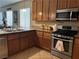 The gourmet kitchen offers sleek stainless steel appliances and plenty of counter space for all your cooking needs at 3609 Citrus Heights Ave, North Las Vegas, NV 89081