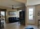 Inviting area features plenty of seating, natural light, and tile flooring for easy maintenance at 3609 Citrus Heights Ave, North Las Vegas, NV 89081
