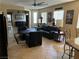 Spacious living room filled with natural light, neutral tones, tile flooring, and comfortable seating at 3609 Citrus Heights Ave, North Las Vegas, NV 89081