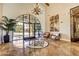 Elegant building lobby with decorative tile flooring, arched entryway and comfortable seating at 3609 Citrus Heights Ave, North Las Vegas, NV 89081