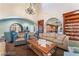 A luxurious lobby showcases comfortable seating, bookshelves, and elegant lighting at 3609 Citrus Heights Ave, North Las Vegas, NV 89081