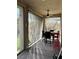 Outdoor patio with ceiling fan, outdoor furniture and shade at 3609 Citrus Heights Ave, North Las Vegas, NV 89081