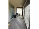Covered patio featuring ceiling fan and roller shades at 3609 Citrus Heights Ave, North Las Vegas, NV 89081