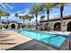 Resort-style pool with palm trees and ample lounge space for relaxing on sunny days at 3609 Citrus Heights Ave, North Las Vegas, NV 89081