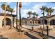 A community pool area surrounded by palm trees and seating offers a relaxing outdoor experience at 3609 Citrus Heights Ave, North Las Vegas, NV 89081