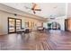 Large event room features ceiling fans, and stylish flooring at 3609 Citrus Heights Ave, North Las Vegas, NV 89081