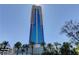 Exterior of the Palms Place tower with palm trees at 4381 W Flamingo Rd # 1019, Las Vegas, NV 89103