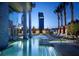 Resort-style pool and lounge area with luxury amenities at 4381 W Flamingo Rd # 1019, Las Vegas, NV 89103