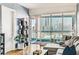 Stylish condo featuring a balcony with city views, an open sliding glass door, and modern black shelves at 4575 Dean Martin Dr # 1811, Las Vegas, NV 89103
