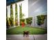 Well-maintained dog park with artificial turf, shade trees, and a fire hydrant at 4575 Dean Martin Dr # 1811, Las Vegas, NV 89103