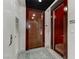 Condo entrance with a dark wood door, neutral rug, and modern fixtures, creating a welcoming and secure feel at 4575 Dean Martin Dr # 1811, Las Vegas, NV 89103