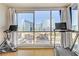 Bright gym area features hardwood floors, cityscape views, and exercise equipment at 4575 Dean Martin Dr # 1811, Las Vegas, NV 89103