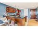 Inviting kitchen featuring a breakfast bar, cherry wood cabinets, and modern appliances, offering a functional space at 4575 Dean Martin Dr # 1811, Las Vegas, NV 89103