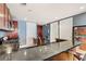 Spacious kitchen featuring dark countertops, cherry wood cabinetry, and ample counter space for culinary enthusiasts at 4575 Dean Martin Dr # 1811, Las Vegas, NV 89103