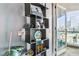 Stylish shelving unit adds personality and storage with open doors to a city view at 4575 Dean Martin Dr # 1811, Las Vegas, NV 89103