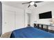Bedroom showcases a ceiling fan, and TV at 4941 Quest Tribe St, Las Vegas, NV 89122