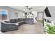 Inviting living room showcasing a large sectional sofa and stylish decor at 4941 Quest Tribe St, Las Vegas, NV 89122