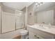 Clean bathroom with a shower and tub combination, white cabinets and a single sink vanity at 5855 Valley Dr # 2108, North Las Vegas, NV 89031