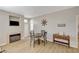 Cozy living area featuring a fireplace, wood floors, and access to the outdoors at 5855 Valley Dr # 2108, North Las Vegas, NV 89031