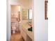 Fresh bathroom with light-colored cabinets and a tile floor at 6412 Big Pine Way, Las Vegas, NV 89108